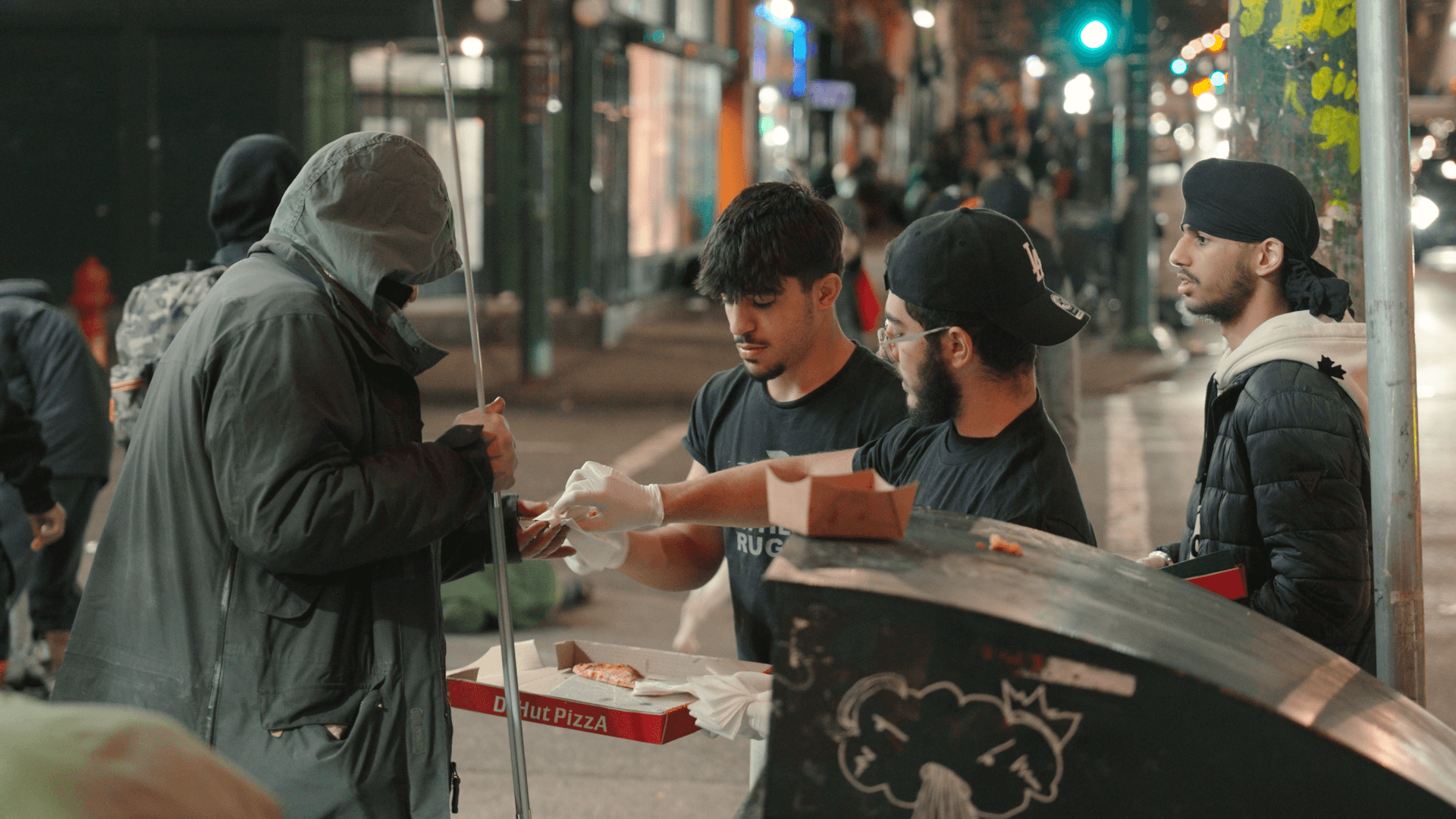 Volunteers distributing meals in the community